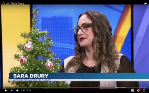 Sara on a television appearance with the "No" Tree